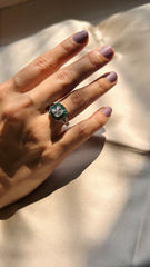 Timeless Solitaire with Tapered Green Gemstone Accents