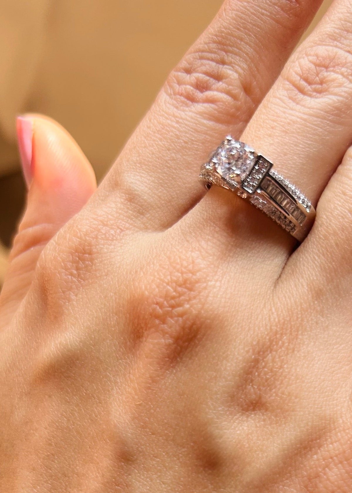 Stellar Brilliance: 1 Carat Elevated Solitaire with Baguette Sparkle