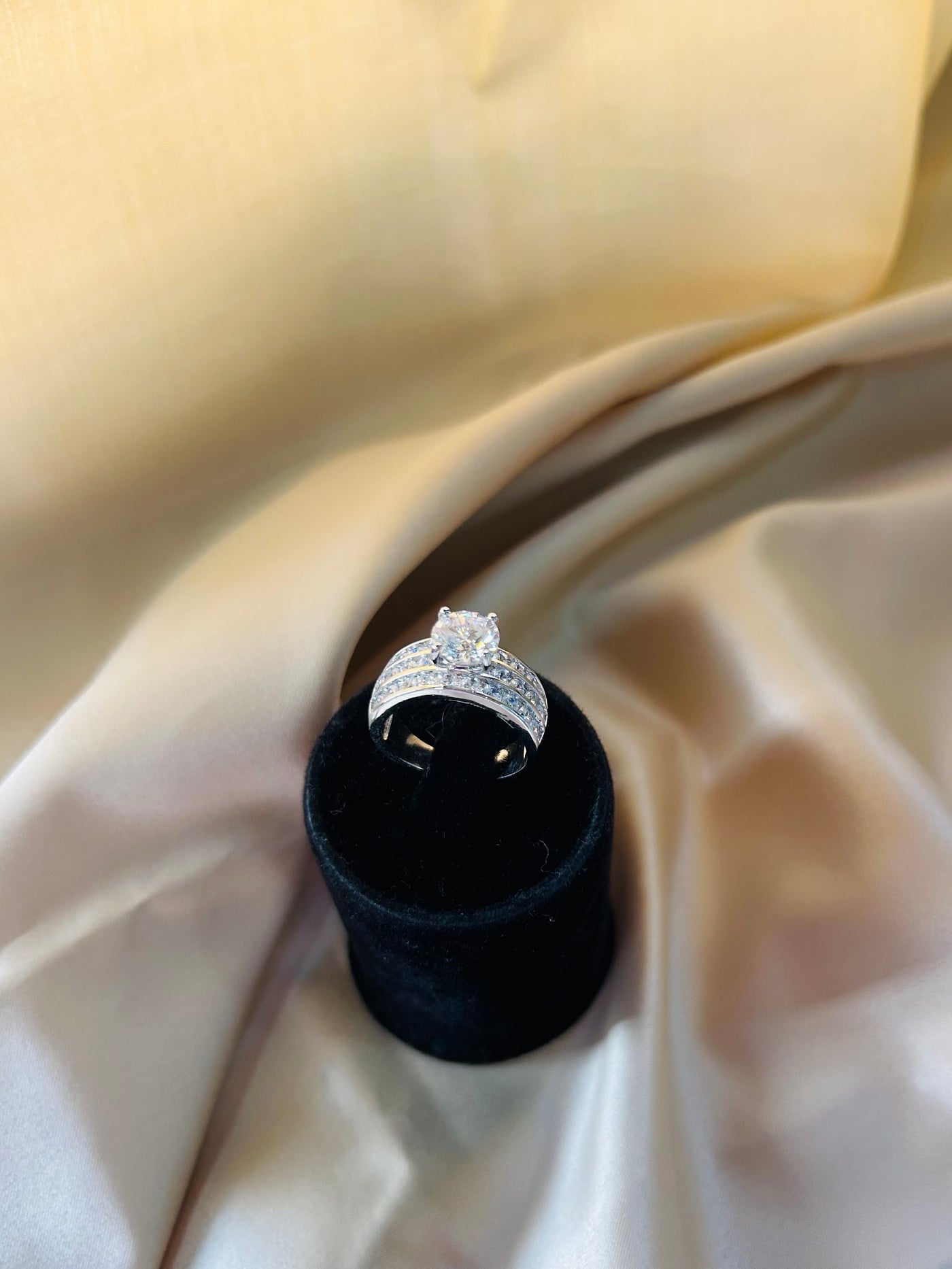 Stunning 2 Carat Elevated Solitaire Diamond Ring with Baguettes