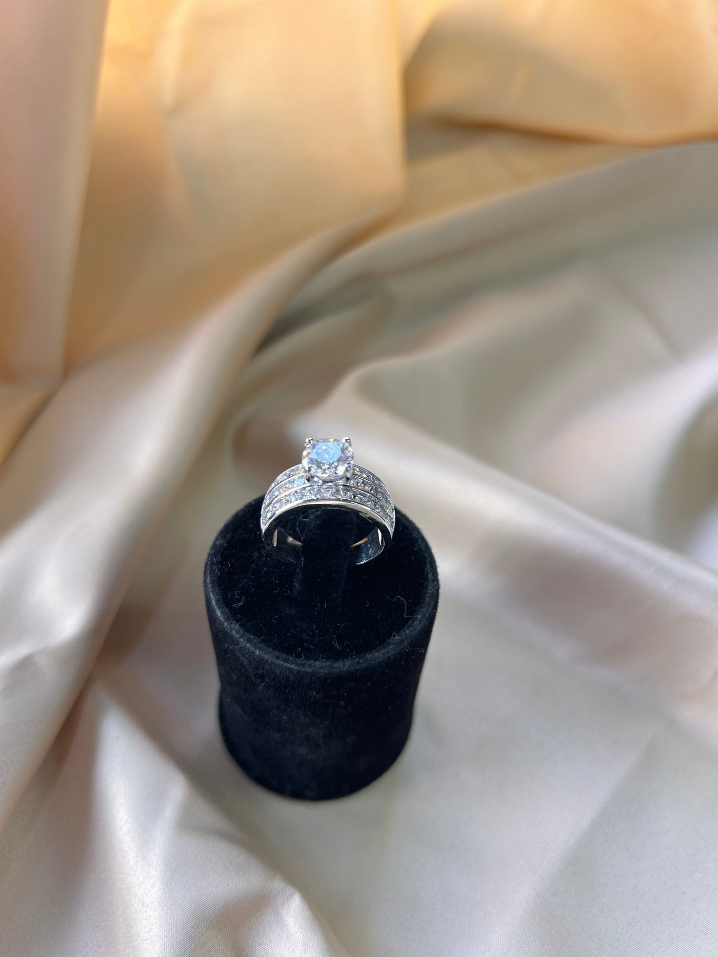 Stunning 2 Carat Elevated Solitaire Diamond Ring with Baguettes