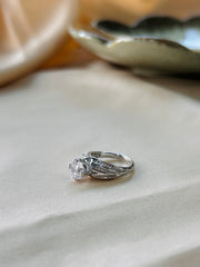 The Serene Swirl: Solitaire Diamond Ring of Endless Grace