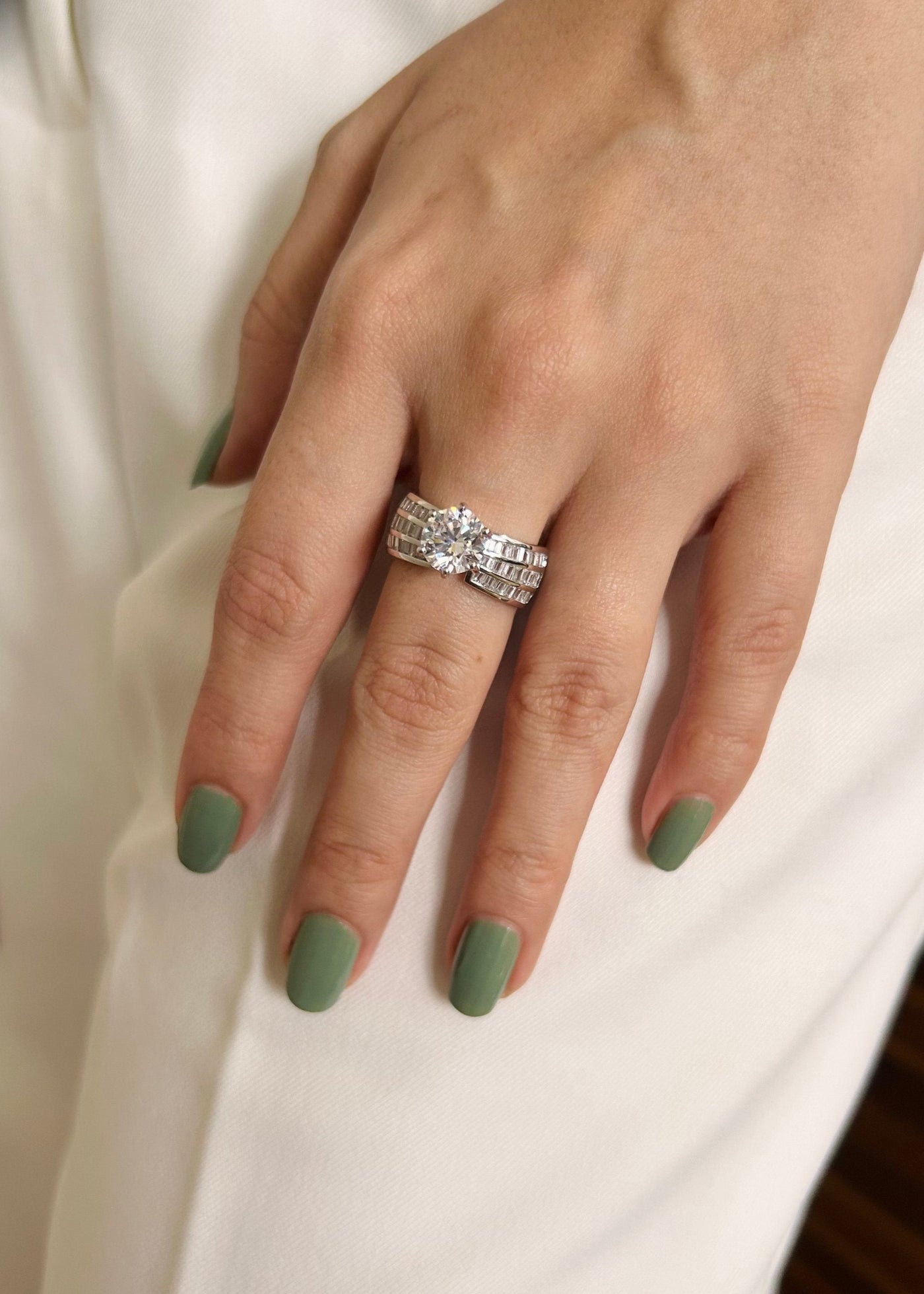 Tapered Elegance - Solitaire Tapered Baguette Diamond Ring