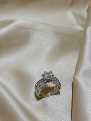 Tapered Elegance - Solitaire Tapered Baguette Diamond Ring