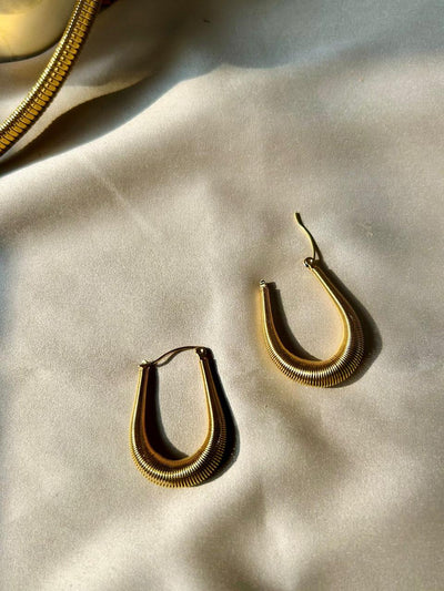 Golden Arcs: Gold-Plated Bali Earrings