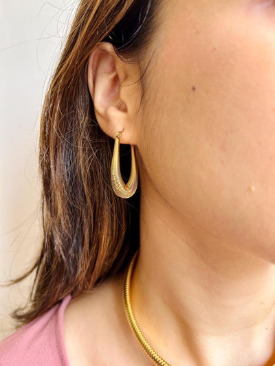 Golden Arcs: Gold-Plated Bali Earrings